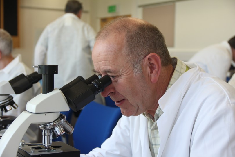 Ken Basterfield NDB confirming an EFB diagnosis under the microscope.